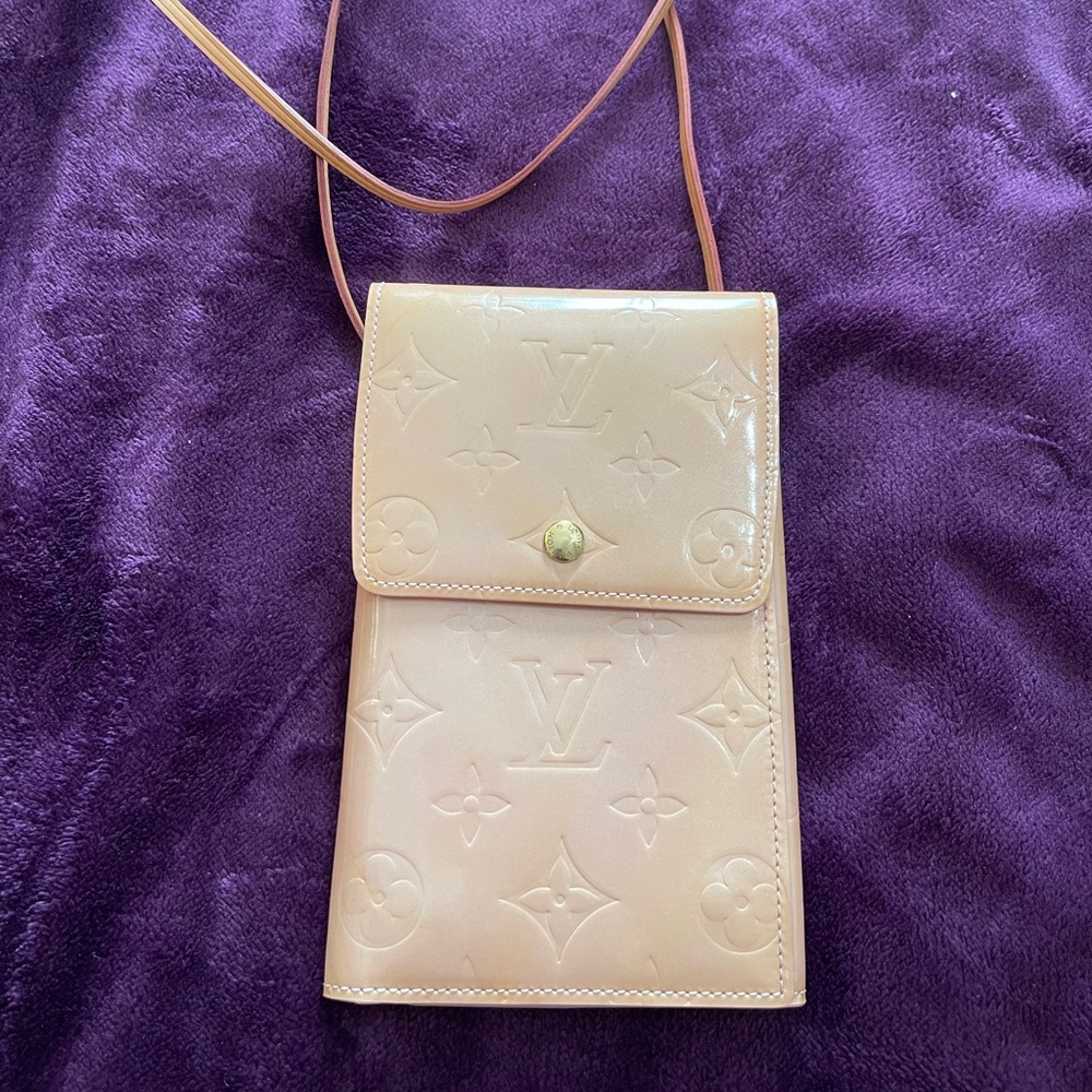 Authentic Louis Vuitton wallet on chain also can be a phone holder